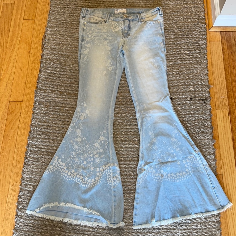 Free People vintage flare denim light blue with star/flower pattern